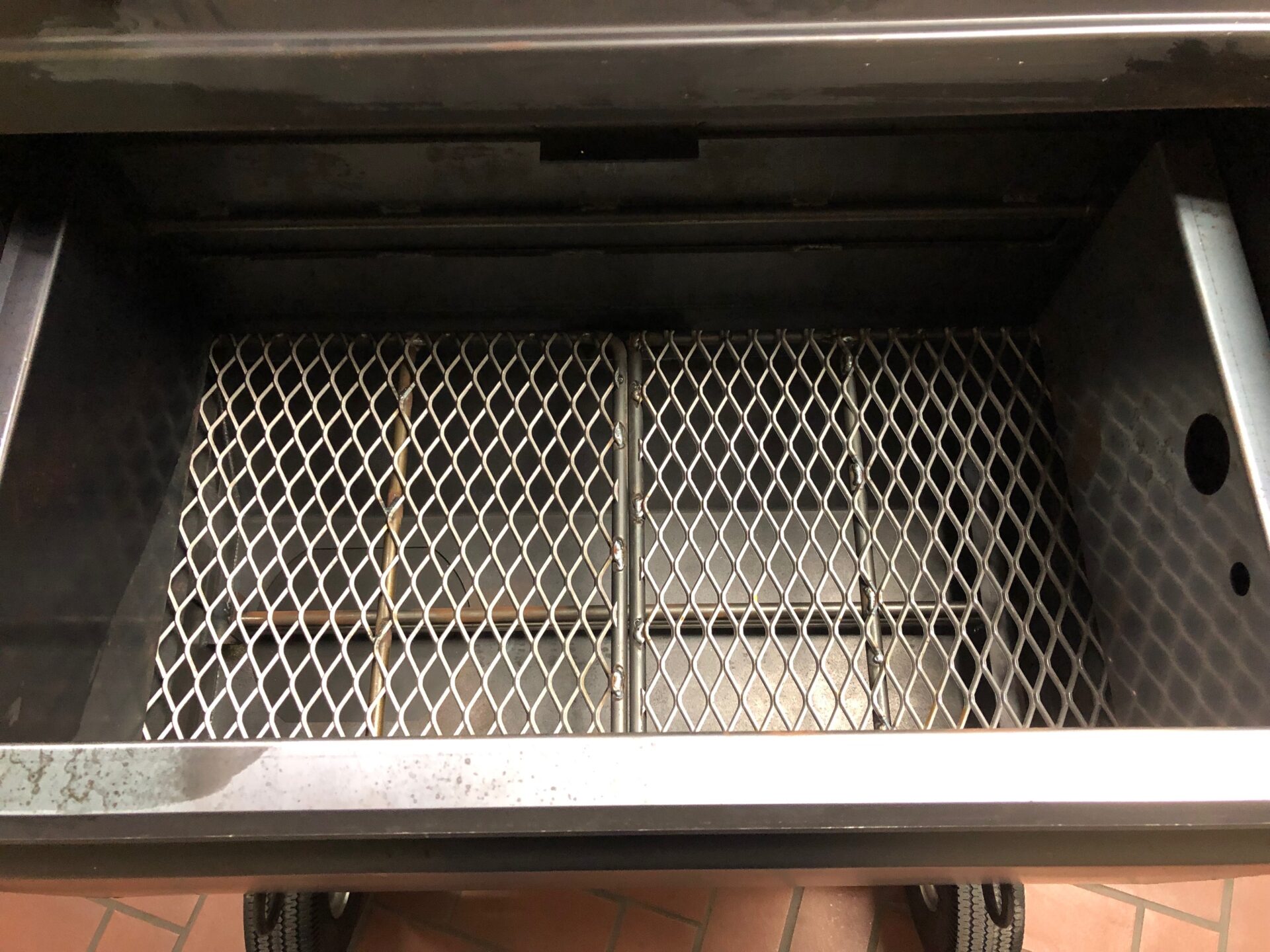 Fire box on the side of the Pit Boss