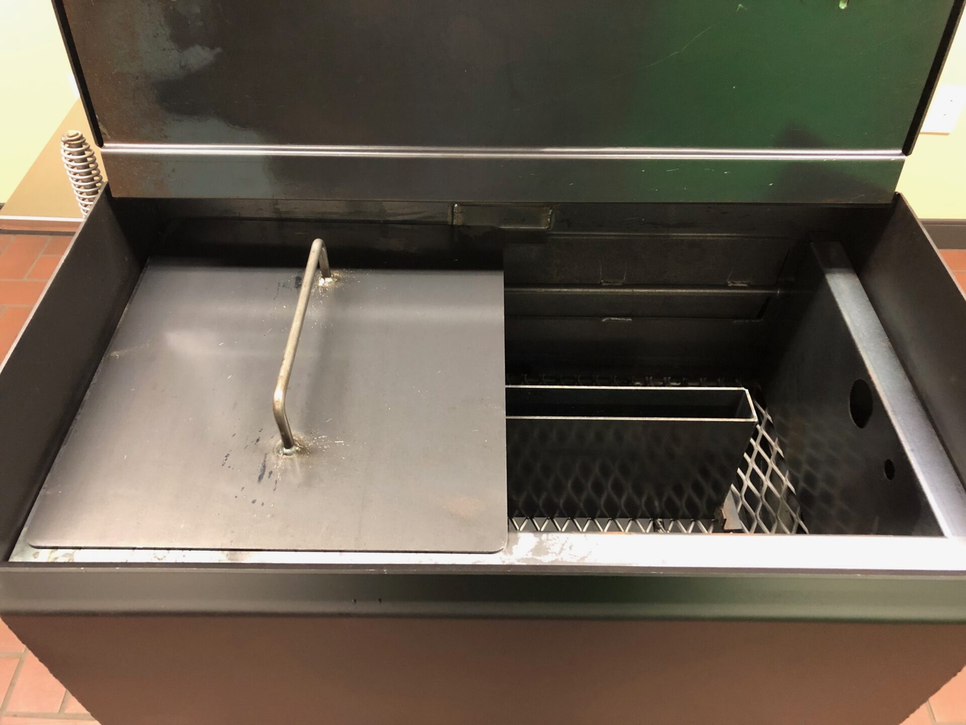 Fire box on the side of the Pit Boss
