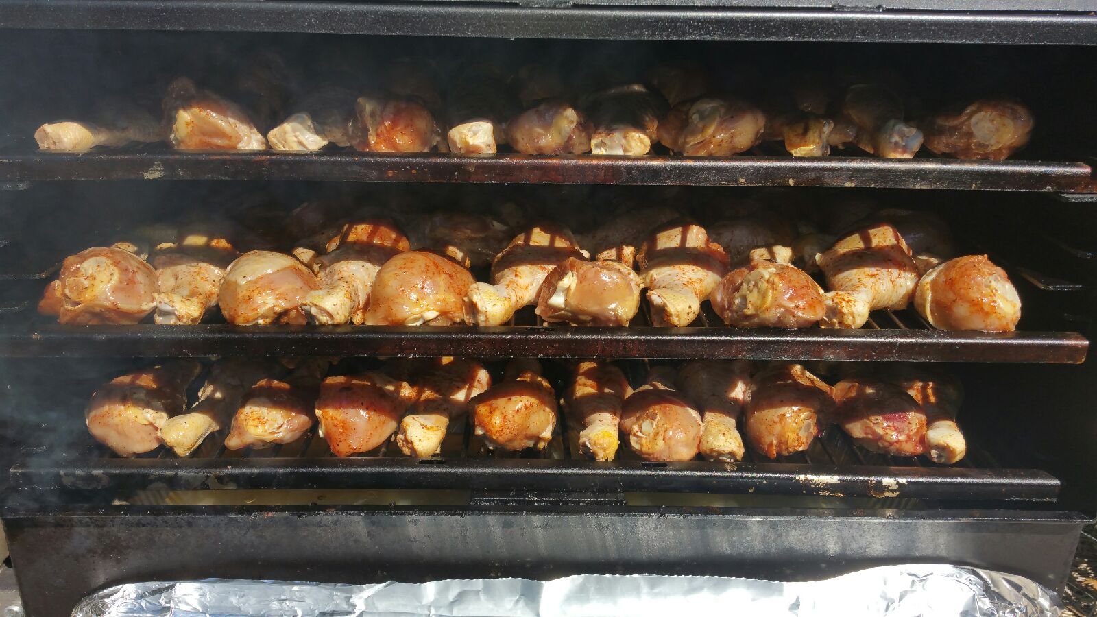 Chicken being smoked on the ABS All-Star