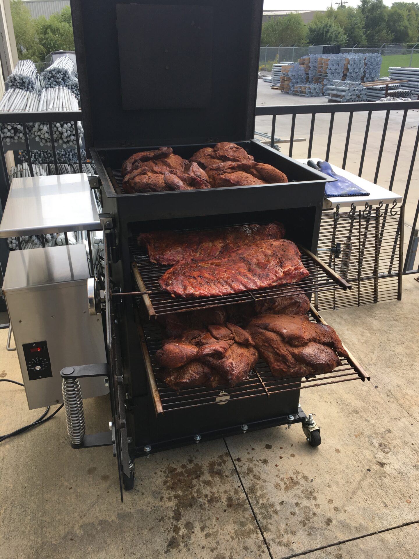 Assortment of meats being smoked on the Bar-Be-Cube