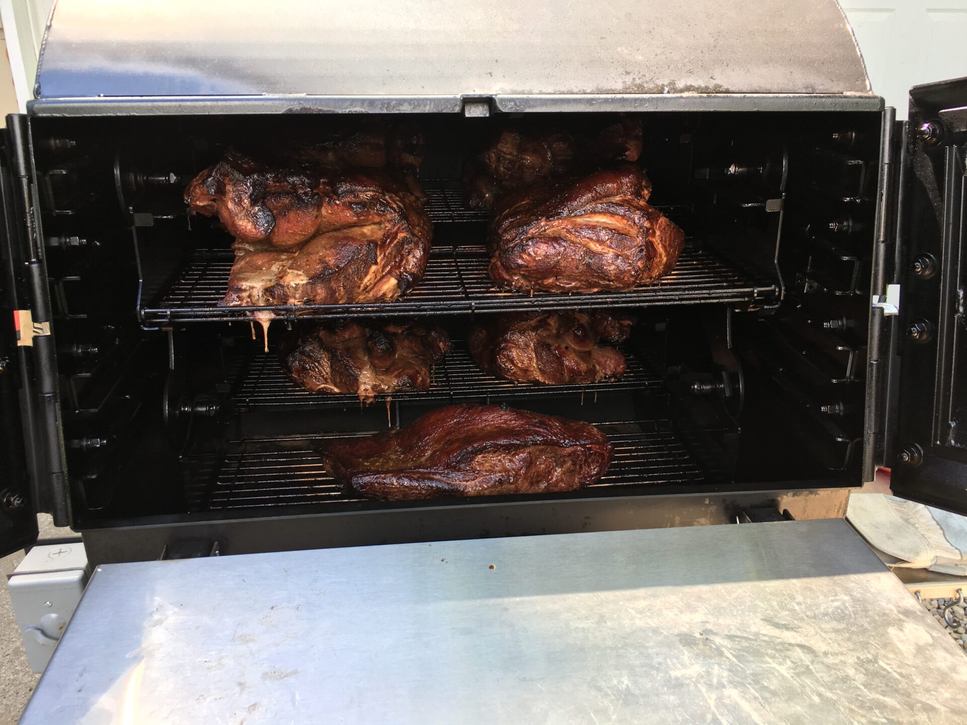 Pit Boss smoking pork butts and briskets