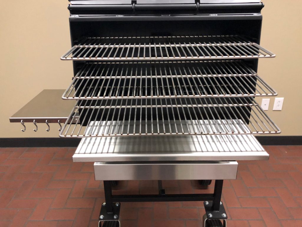 With the doors open, you can see the ample grilling racks inside. 
