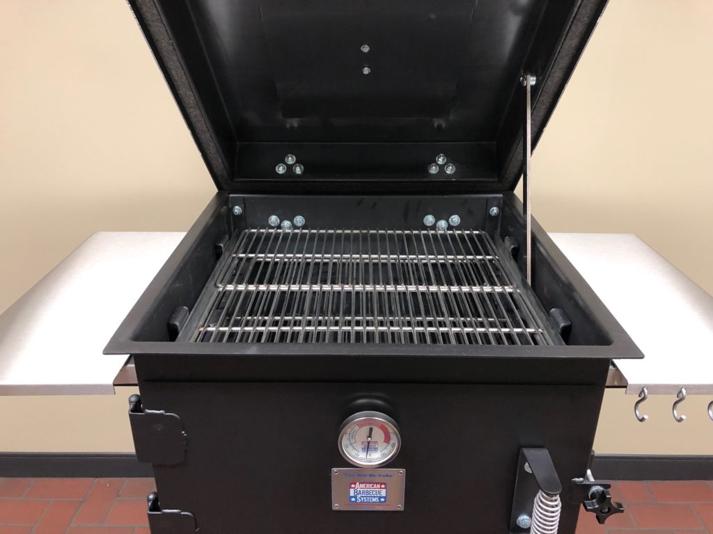 The Bar-Be-Cube Smoker/grill features a large grilling surface.