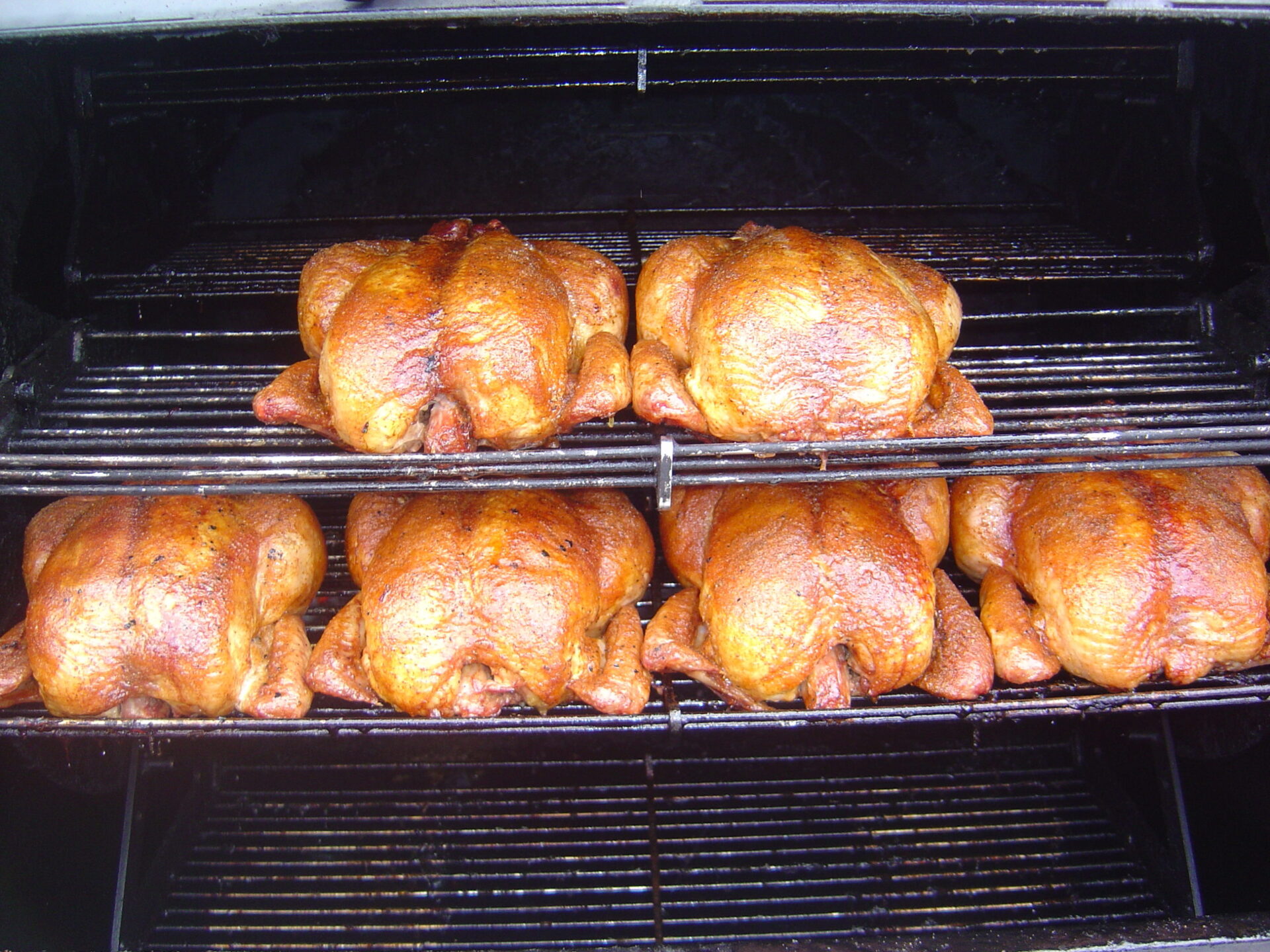chickens cooking in The Pit Boss