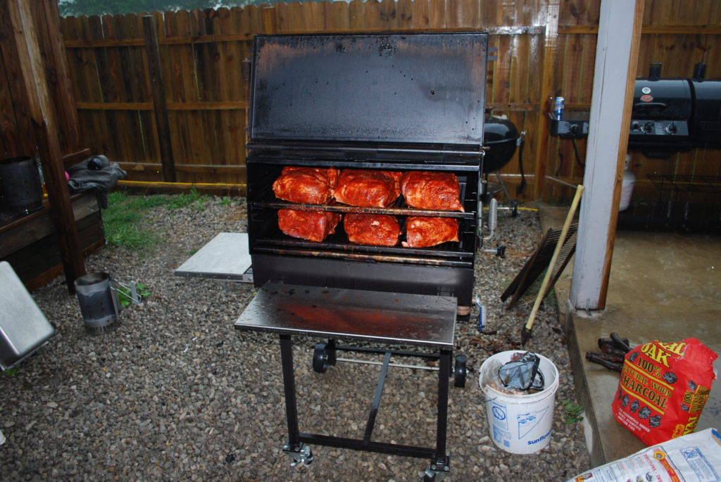 Brisket being cooked with the doors open for a good view. 