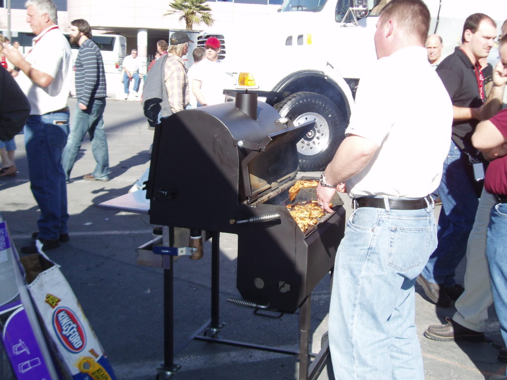 Food being served after being cooked on the ABS smoker/grill.