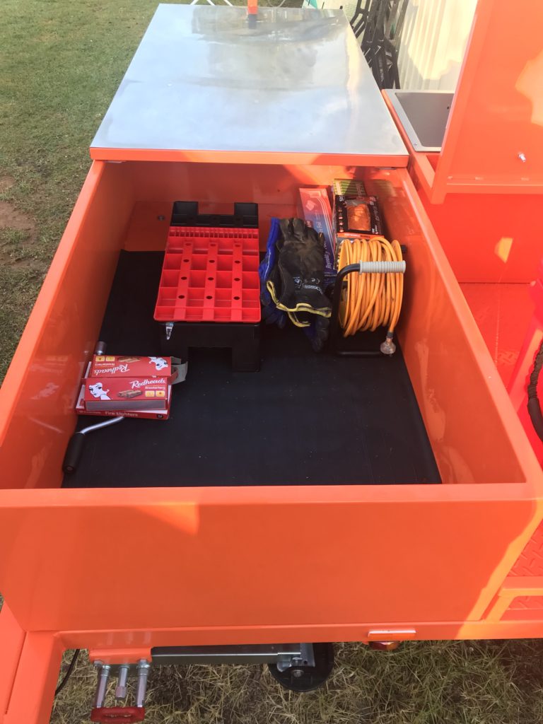 Gather together all your needed supplies in the custom trailer, made for this ABS Judge. 