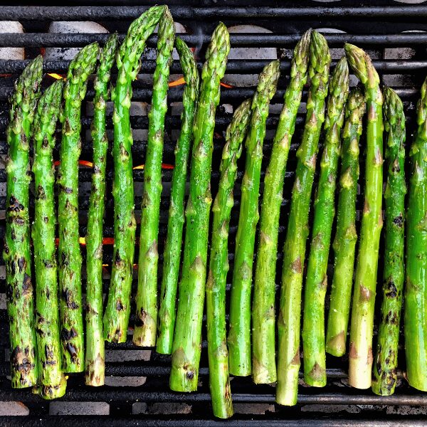 New spring recipes include grilled asparagus with lemon garlic butter. 