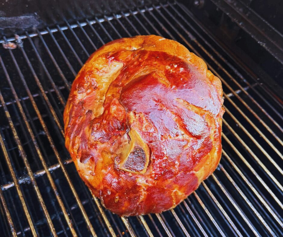 Image of barbecue being prepared on an American Barbecue Systems smoker, the Bar-Be-Cube. Barbecue etiquette is the subject of this blog. 