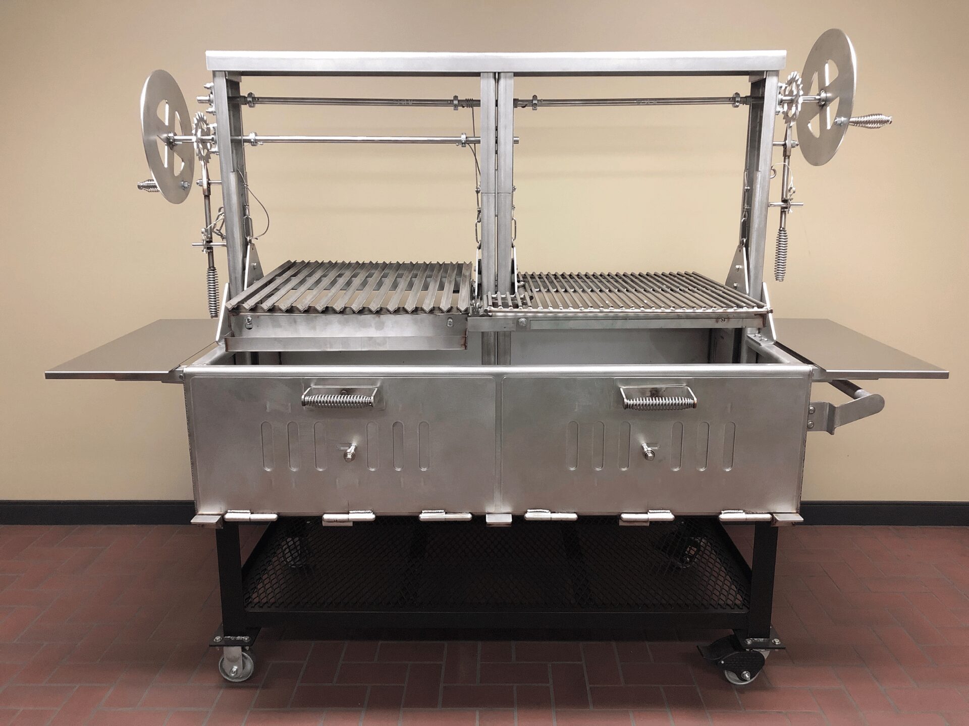 The SMG SS 60 Santa Maria Grill with the top grates lifted up.